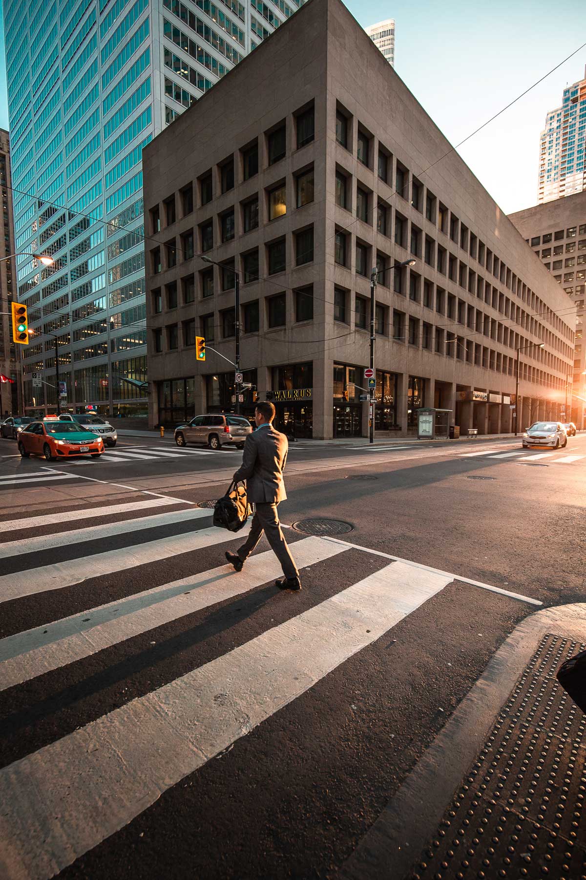 biz-law business person crossing intersection